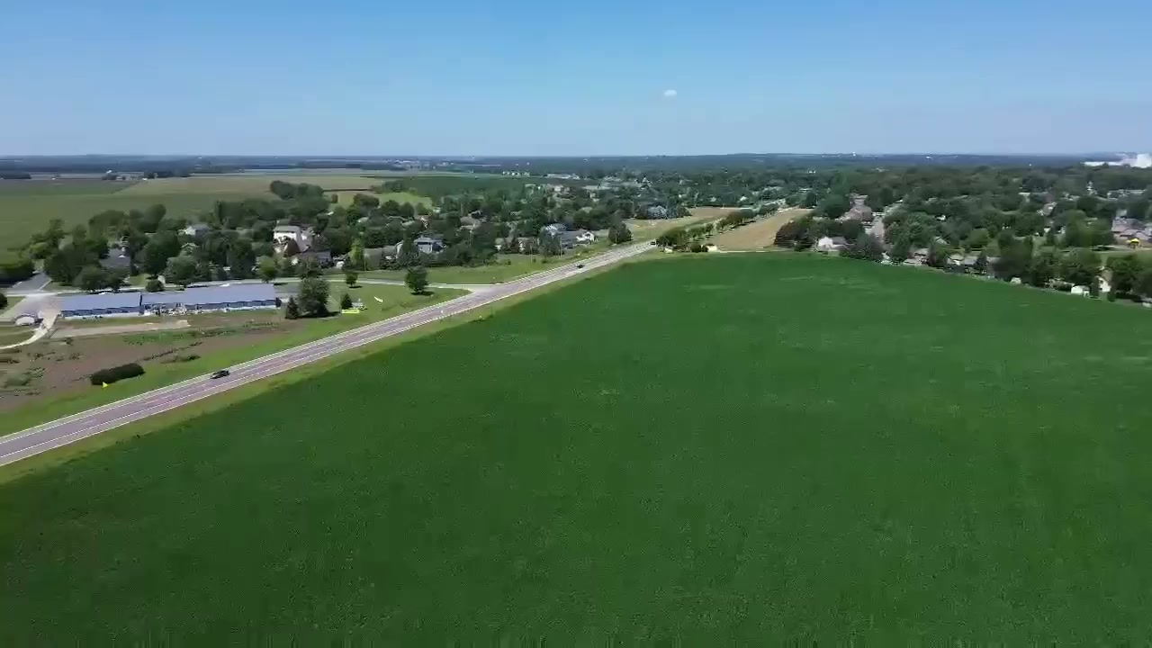 Aerial view of the Walden of Hastings site along the road and surrounding green fields