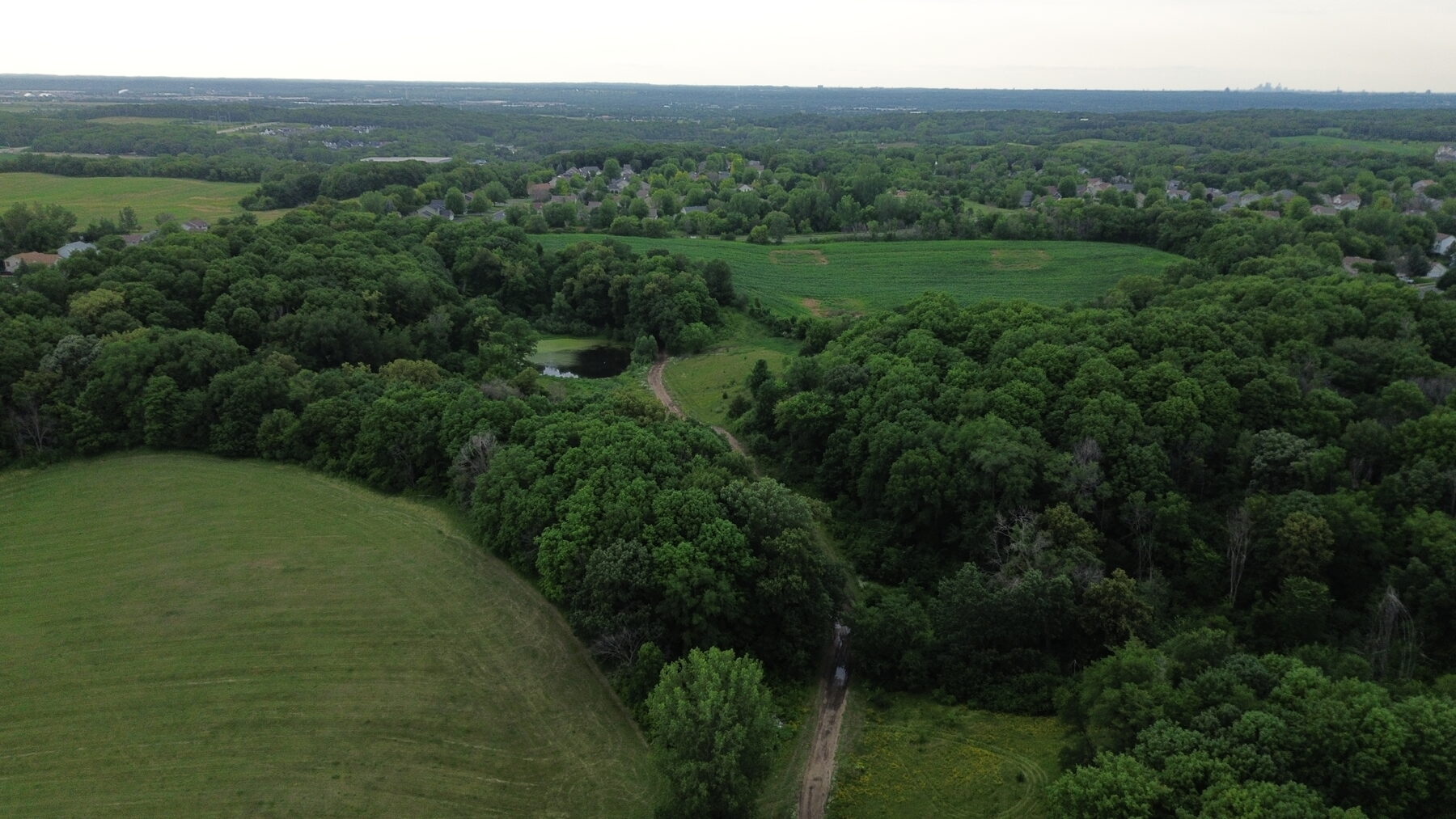 Aerial context view of the parcel with Prior Lake in the distance
